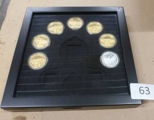 lot 63 image: Coin case with Corvette and BelAir coins