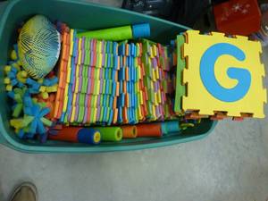 lot 79 image: large tote full of foam interlocking blocks and other foam toys