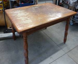 lot 82 image: Table that needs some refinishing 30x41 plus two 8 inch extensions