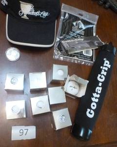 lot 97 image: 8 new golf balls, hat, golf club grip, gorilla grip, payne stewart coin