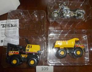 lot 109 image: 3 new miniatures Tonka crane, dump truck, Harley motorcycle about 4 inches long