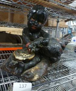 lot 137 image: Black americana pottery figure with chicken