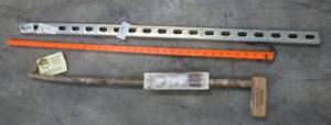 lot 139 image: yard stick, hillbilly putter and a piece of strut