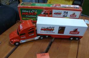 lot 166 image: TWO 2004 Mickey Mouse and Coca-Cola Semi Trucks - light up