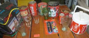 lot 175 image: 13 Coke glasses, tins, cooler, puzzle, Insulated bag cooler with radio