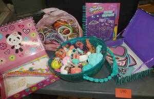 lot 190 image: Girls bracelets (guessing 75) sketchbook, LOL Surprise dolls in carry case