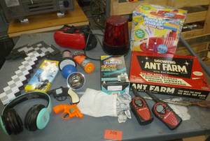 lot 208 image: Ant Farm, 3D glasses, headphones, flashing light, Midland walkie talkies, glow in the dark slime and more