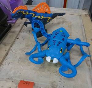 lot 214 image: Two battery operated toys, walkingtalking Trex dinosaur and squid
