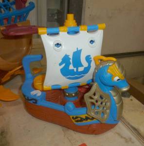 Large Dragon ship and small dragon ship both by Mattel