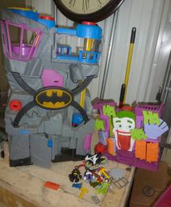 lot 227 image: Large Batman Cave (2 ft tall)  and Jokers place Fisher Price 2010