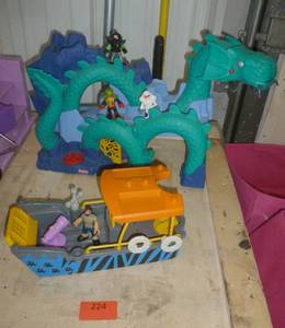 lot 228 image: Fisher Price serpent and a boat