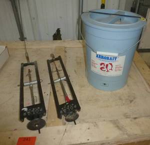 lot 241 image: Two ice fishing tip ups and Aerobait bucket