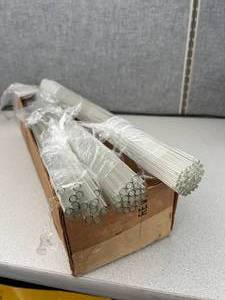 lot 11 image: Box of 8mm x 2ft Glass Tube Box, Comes with glass rods no hole as well.