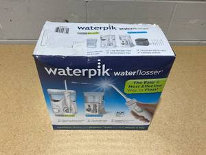 lot 219 image: Waterpik Ultra Plus Water Flosser