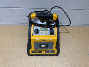 lot 221 image: Cat Power Station with 1,200-Peak-Amp Jump Starter, Tire Compressor, and Power Inverter, CJ1000DXT