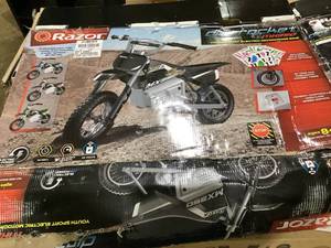 lot 441 image: Razor Dirt Rocket MX350 - Black with Decals, up to 14 mph, 24V Electric Dirt Bike for Child 8