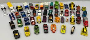 lot 34 image: Misc. Vintage Miniature Die cast Cars Including Black Walls & More