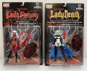 lot 38 image: Chaos Comics Brian Pulidos  Lady Demon & Lady Death Sculpted By Clayburn Moore Action Figure (NIB)