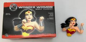 lot 79 image: DC DIRECT The Animated Series Justice League (WONDER WOMAN) Wall Plaque Hand Painted Cold-Cast Porcelain Wall Plague Sculpted By John C. Mathews (NIB)