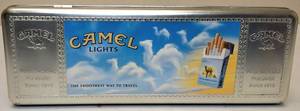 lot 12 image: COLLECTORs EDITION  CAMEL LIGHTS Promotional Sign, Lighter and collectors tin.