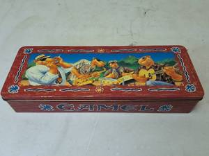 lot 13 image: 1994  JOE CAMEL Collection Tin, collectable empty  pack packaging  and lighter along with the collector posters