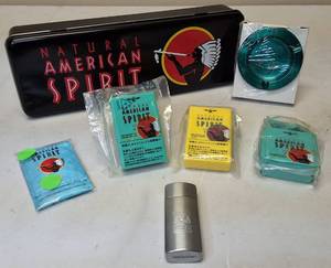 lot 14 image: NATURAL AMERICAN SPIRIT promotional tin with all the original items