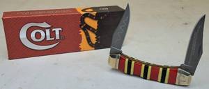 lot 37 image: Colt  Coral Snake Double Lockback Folding Knife