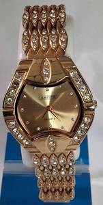 lot 52 image: Abiste  Womens Quartz Watch w Gold and Rhinestone watch