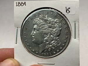 lot 18 image: 1884 Morgan Silver Dollar