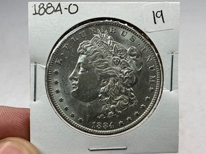 lot 19 image: 1884-O Morgan Silver Dollar