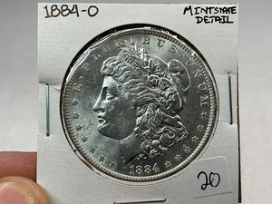 lot 20 image: 1884-O Morgan Silver Dollar