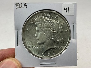 lot 41 image: 1924 Peace Silver Dollar