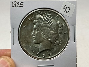 lot 42 image: 1925 Peace Silver Dollar