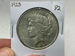 lot 82 image: 1923 Peace Silver Dollar
