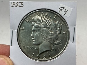 lot 84 image: 1923 Peace Silver Dollar
