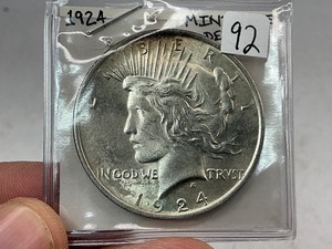 lot 92 image: 1924 Peace Silver Dollar