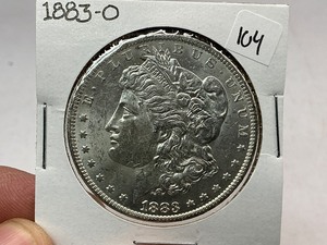 lot 104 image: 1883-O Morgan Silver Dollar