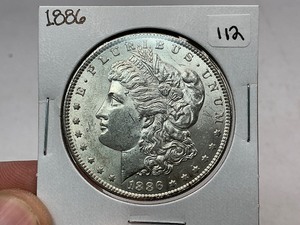 lot 112 image: 1886 Morgan Silver Dollar