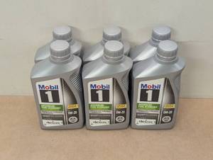 lot 77 image: 6 Pack - Mobil 1 Advanced Fuel Economy Full Synthetic Motor Oil 0W-20, 1 Quart (Pack of 6)
