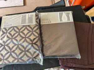 lot 114 image: Set of 2 Sealed Curtain Panels - Patterned and Solid Design