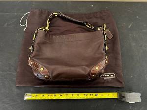 lot 122 image: Like New Coach Brown Leather Handbag with Dust Bag