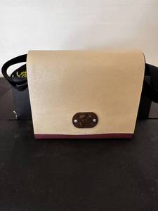 lot 126 image: Handcrafted Crossbody Bag with Recycled Materials and Adjustable Strap