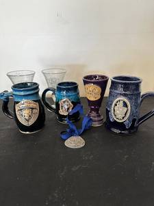 lot 140 image: Collection of 6 Minnesota Renaissance Festival Mugs and Goblets with Medals