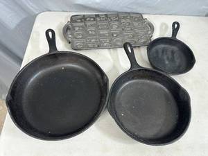 lot 37 image: Cast Iron Pans and Cookie Mold