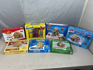 lot 60 image: Assorted Gingerbread Houses, Specialty Candy Houses, Nesquik Gift Set