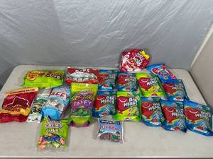 lot 78 image: Assorted Candy, Air Heads, Taffy, Chupa Chups, Junior Mints, and More