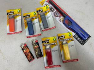 lot 99 image: 8 New Assorted Lighters