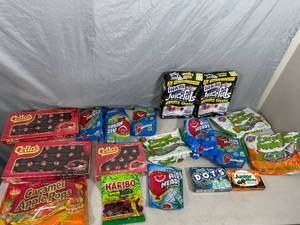 lot 106 image: Large Lot of Candy, Chocolate Cherries, Caramel Apple Pops, Airheads, and More