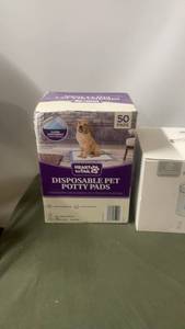 lot 1 image: Pet Supplies Bundle Disposable Pet Potty Pads, Smart Pet Water Feeder, and Roller Cat Toy