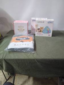 lot 4 image: Pet Bundle Dog Birthday Cookie Cake, Front Seat Cover and Circular Turntable Cat Toys